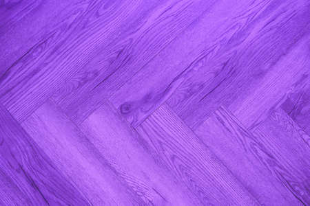 Background of lilac-colored wood natural texture. Triangular surface design to the left side. High quality photoの写真素材