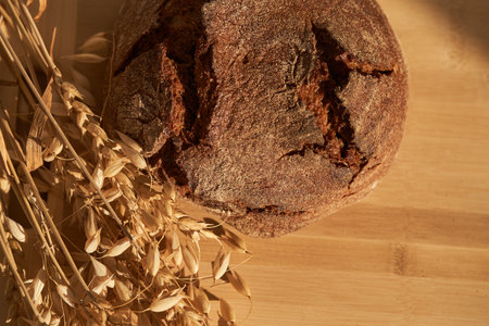 Top view of freshly baked rye bread on a yeast-free starter and on mixture of whole grain, rye and...