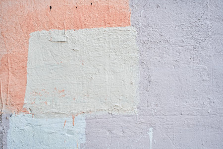 Fine-grained plaster applied by hand. Exterior plaster with space to copy. Warm colored background with the texture of rough grainy stone. High quality photoの写真素材