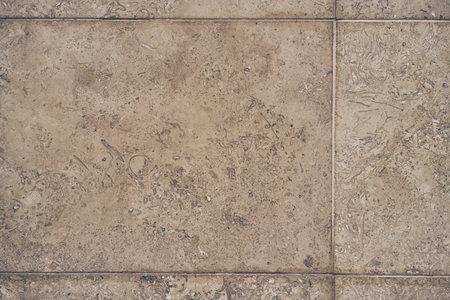 The texture of the beige stone surface. Stone tile with space to copy. High quality photoの写真素材