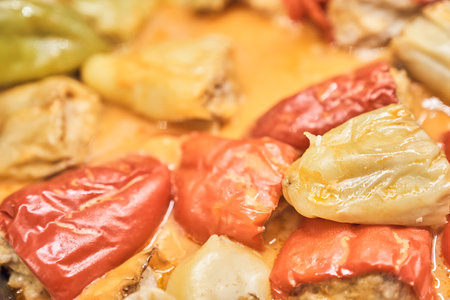 Stuffed peppers with rice and stuffed meat. Close-up of boiled vegetables in broth. The cooking process with the possibility of copying. High quality photoの写真素材