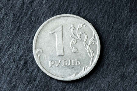 Russian coin one ruble on a black background macro photoの写真素材
