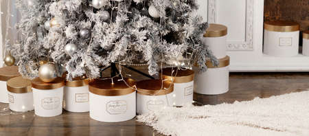 Gifts in boxes under the tree, new year 2022. High quality photo