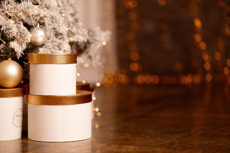 Gifts in boxes under the tree, new year 2022. High quality photoの写真素材