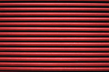 Metallic red texture, metal stripes, background. High quality photoの写真素材