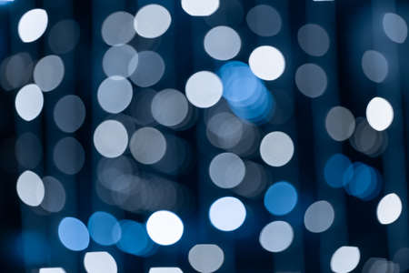 Background in the form of a bokeh of blue color, a lot of New Year's bokeh. High quality photoの写真素材