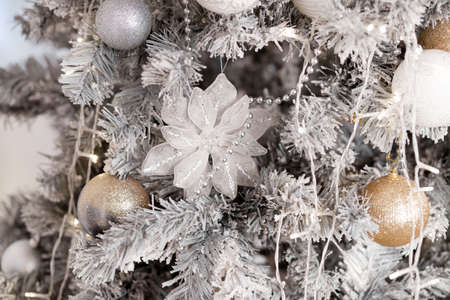 beautiful white Christmas decorations on a white tree, new year 2022, holidayの写真素材
