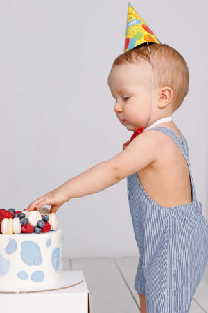 Cake with berries for the birthday of the baby