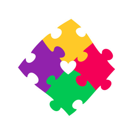 Colorful puzzle with a cutted heart inside. Symbol for World Autism Awareness Day. Vector illustration on a white backgroundのイラスト素材