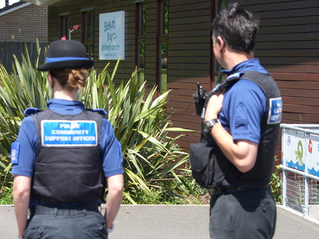 Devon and Cornwall police PCSO male, PCSO female on the beat in Bideford Park