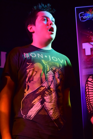 Young lad singingの写真素材