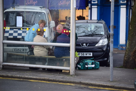 Ambulance deals with an old lady who fell over while out shopping in Bideford, Devon a small down in the cost of England. The lady was okay and was taken to Hospitalのeditorial素材