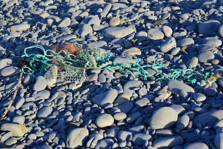 Fishing equipment washed from seaの写真素材