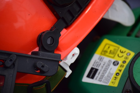 Hedge cutter and hard hatの写真素材