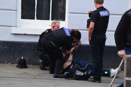 This morning we arrested a local man who was wanted on a Recall to Prison.  The arrest at around 11:45 am involved a foot chase along Bideford Quay and then into Cooper street. Unfortunately just prior to the man being detained in Cooper Street a member oのeditorial素材