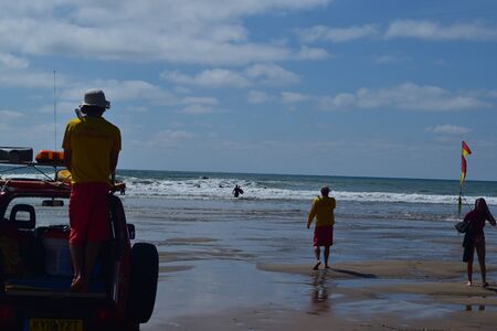 RNLI Lifeguards on duty at Budeのeditorial素材