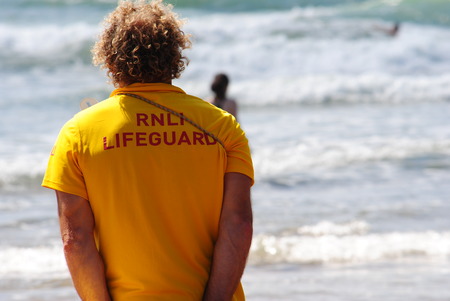 RNLI Lifeguards on duty at Budeのeditorial素材
