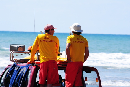 RNLI Lifeguards on duty at Budeのeditorial素材