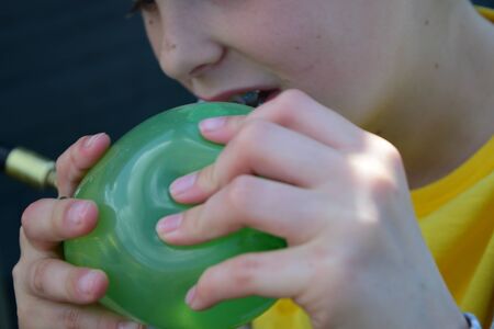 Young boys Have water fight with water bombs
