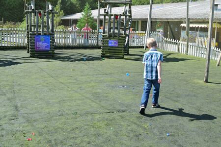 Young boys Have water fight with water bombsのeditorial素材