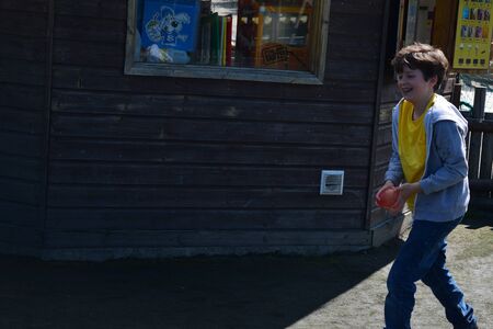 Young boys Have water fight with water bombsのeditorial素材