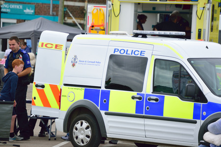 Devon and Cornwall police Van Parted in-front of an ambulanceのeditorial素材