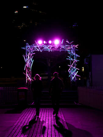 SYDNEY, AUSTRALIA - JULY 1, 2017: A silhouette of couple walking from the entrance of Sydney Winter Festivalのeditorial素材