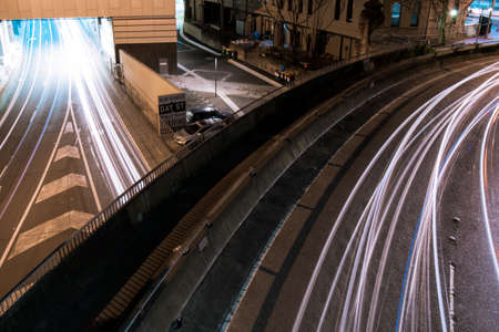 Car trails at night street on the city.の写真素材