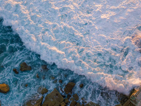 White wash of wave aerial view.