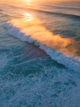 White wash of wave breaking under the sunlight.