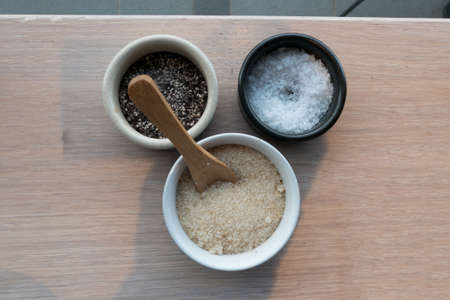 Top view of sugar, salt, and pepper.の写真素材