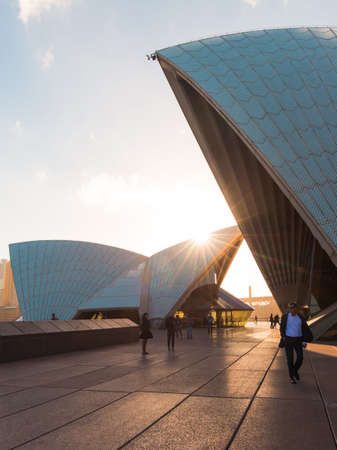 Sydney, Australia - October 12, 2017: Golden light strikes in Sydney Opera Houseのeditorial素材