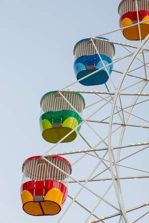 Colorful carriage on ferris wheel.