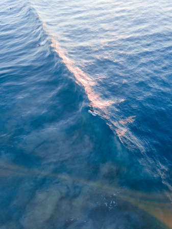 One surfer started to ride the wave.