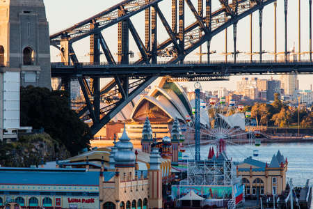 Sydney, Australia - June 30, 2018: Morning view of Luna Park, Sydney Harbour Bridge, and Sydney Opera House.のeditorial素材