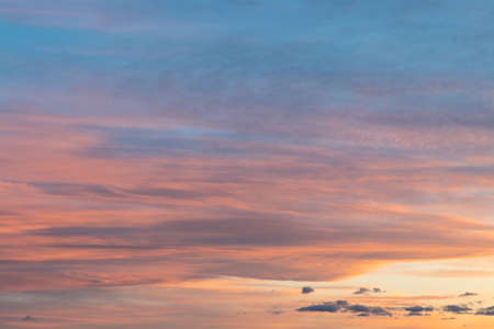 Blue and orange colorful sunset sky.の写真素材