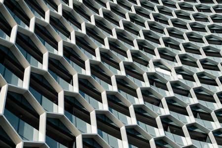 Singapore - December 4, 2018: Close-up view of honeycomb hexagonal building facade.