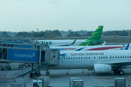 Jakarta, Indonesia - January 7, 2019: Aircrafts of Garuda Indonesia, Citilink, and Malaysia Airlines at Soekarno Hatta International Airport Terminal 3のeditorial素材