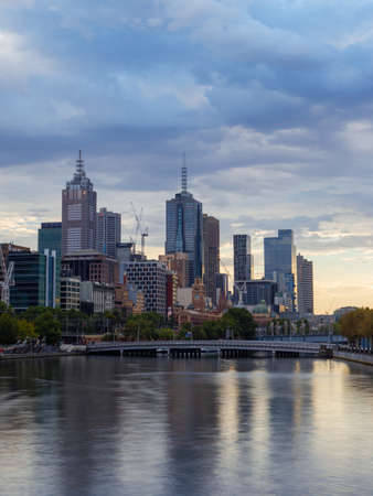Melbourne, Australia - January 12, 2019: View of Melbourne CBD skyline with cloudy sky across the Yarra River.のeditorial素材
