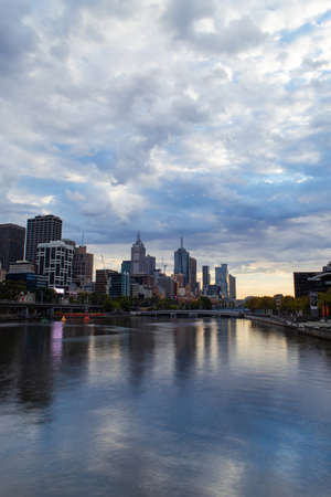 Melbourne, Australia - January 12, 2019: View of Melbourne CBD skyline with cloudy sky across the Yarra River.のeditorial素材