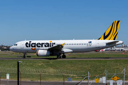 Sydney, Australia - February 12, 2019: Tigerair Australia Airbus A320 taxiing at Kingsford Smith Sydney International Airport. Registration: VH-VNKのeditorial素材