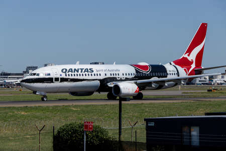 Sydney, Australia - February 12, 2019: Qantas Boeing 737 with Mendoowoorrji livery taxiing at Kingsford Smith Sydney International Airport. Registration VH-XZJのeditorial素材