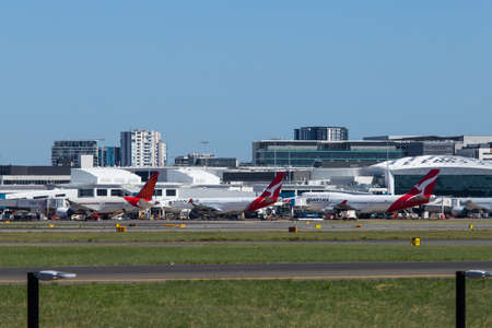 Sydney, Australia - February 12, 2019: Qantas Boeing 747 and Qantas A330 parking at Sydney Airport.のeditorial素材