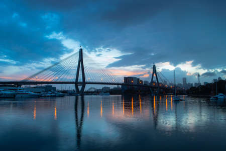 Sydney, Australia - March 9, 2019: Anzac Bridge view with the reflection at sunrise time.のeditorial素材