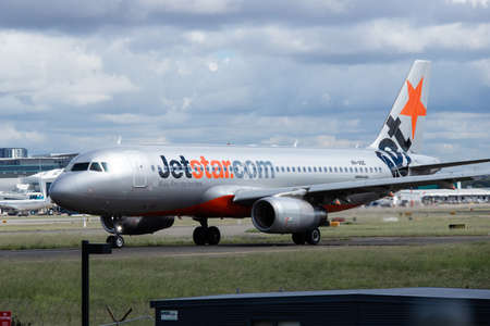 Sydney, Australia - March 20, 2019: Jetstar Airbus A320 taxiing at Sydney Kingsford Smith International airport runway. Registration: VH-VQCのeditorial素材