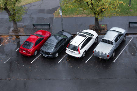 Adelaide, Australia - May 11, 2019: Top view of car parked in angled parking on the road side.のeditorial素材