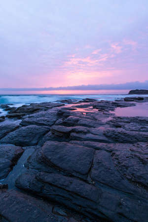 Rock formation view during an overcast sunrise.の写真素材