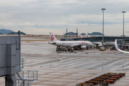 Hong Kong - October 6, 2019: Dragonair Airbus A320 at Hong Kong International Airport tarmac. Registration: B-HSEのeditorial素材