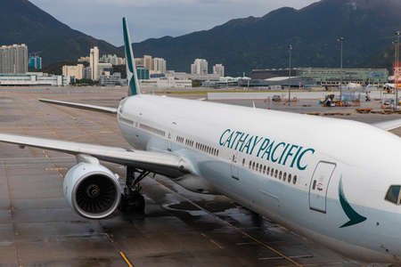 hong kong, airbus, airbus a330, cathay pacific, machine, business, blue, sky, technology, engine, transport, turbine, plane, tourism, airline, trip, passenger, airliner, jet, travel, aviation, flight, airport, transportation, airplane, aircraftのeditorial素材