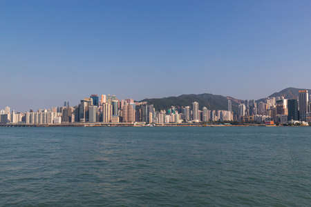 Hong Kong - October 3, 2019: Day time skyline of Hong Kong Island with clear blue sky.のeditorial素材